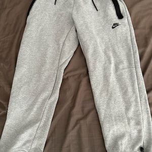 Grey Nike tech loose bottoms size large